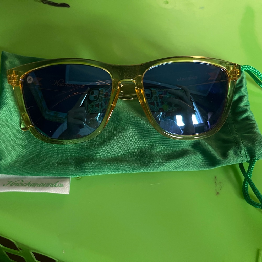 Yellow, transparent Knockaround sunglasses